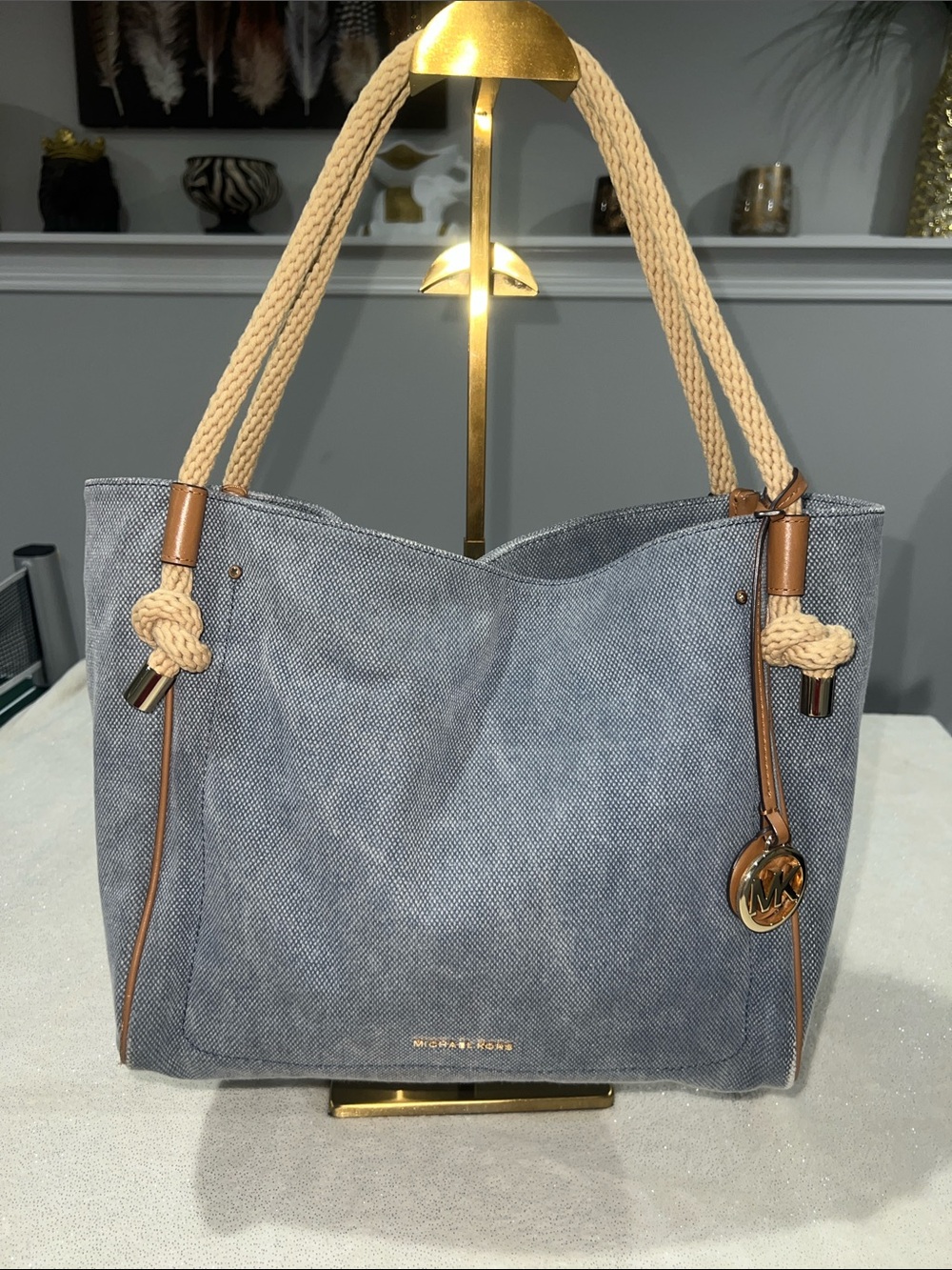 Michael Kors Isla Large Tote Bag, washed denim with signature rope handles.